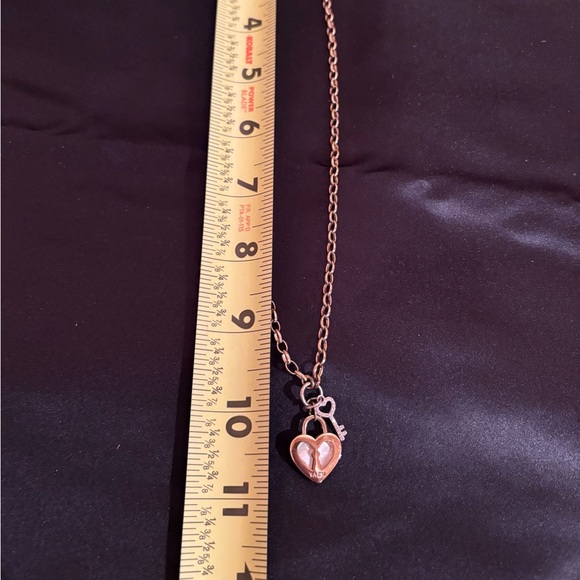 Cubic Zirconia Key and Genuine Mother of Pearl
Inlay Stone Heart Necklace - Picture 6 of 7